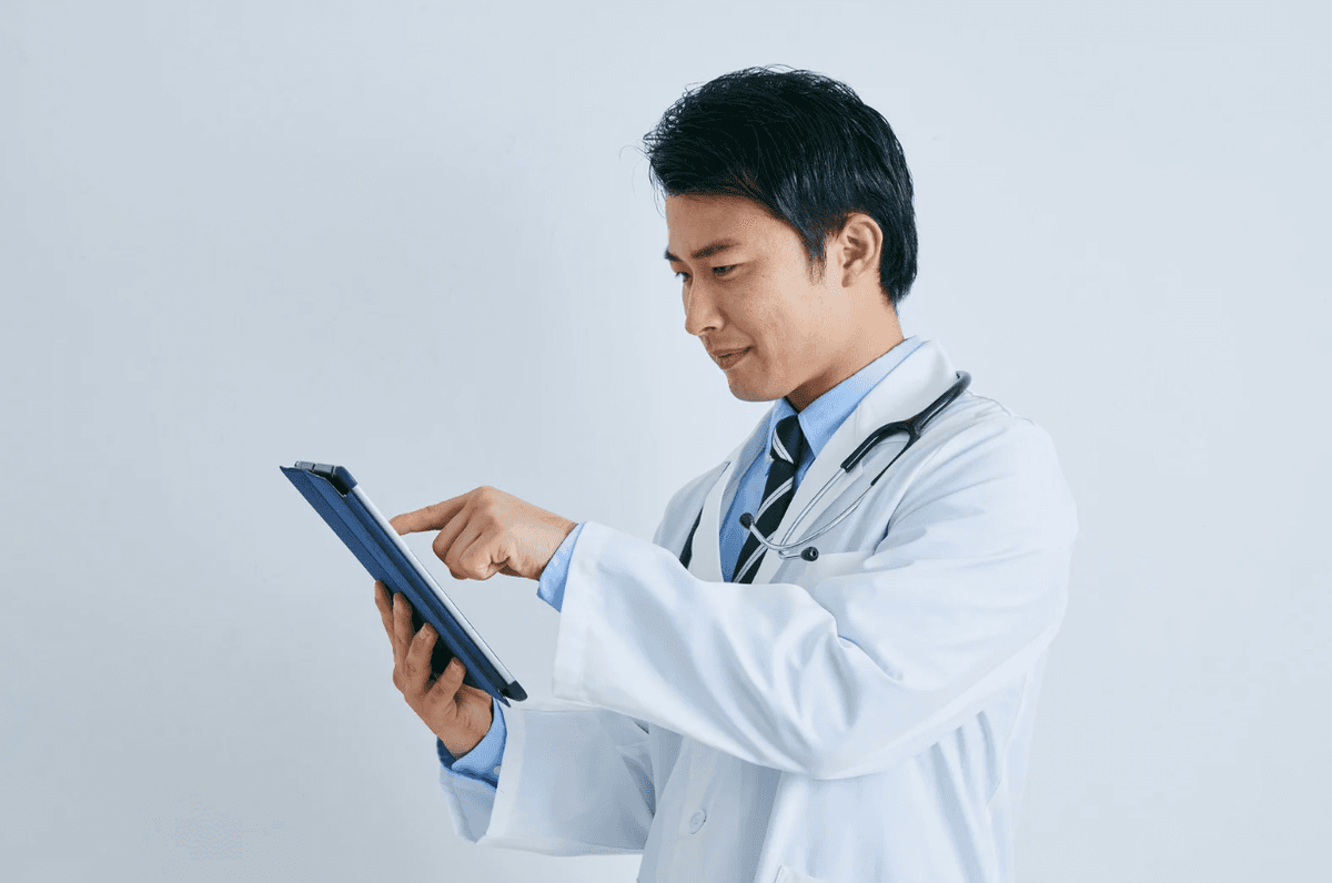 Doctor using tablet